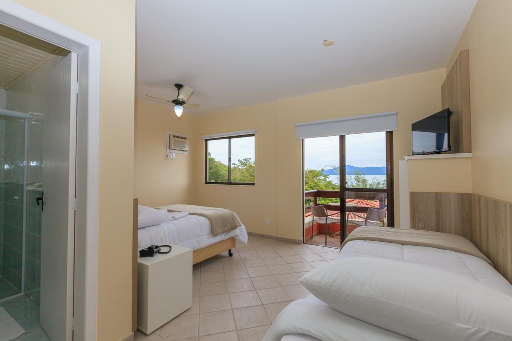 Letto Hotel Jurere Guest House Florianopolis Bagian luar foto
